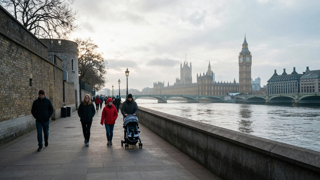 Family walking on Thames Path with Big Ben in the background.